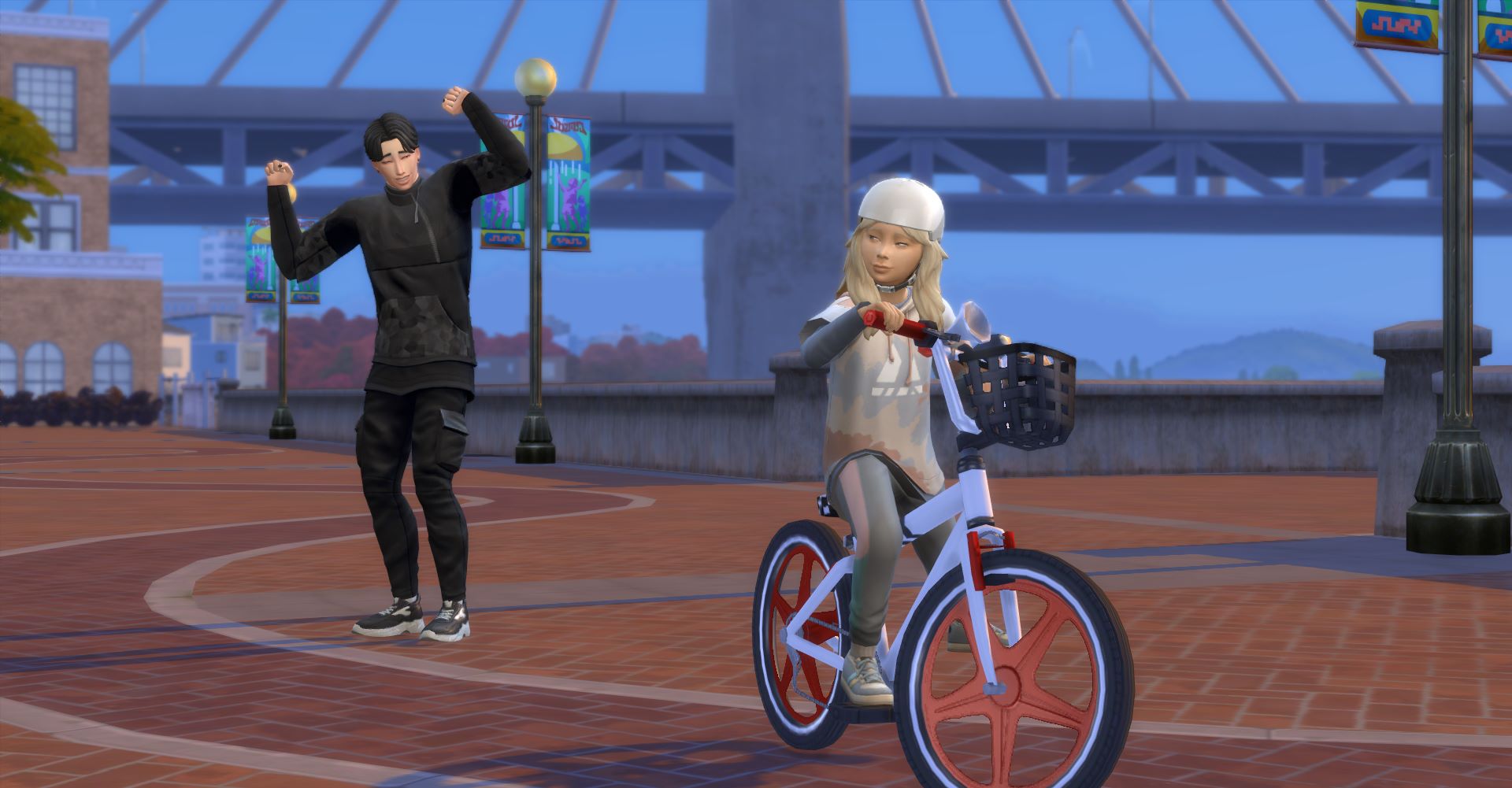 Іан навчає Санні кататись на велосипеді